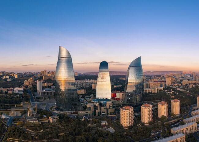 City skyline under blue sky during daytime photo